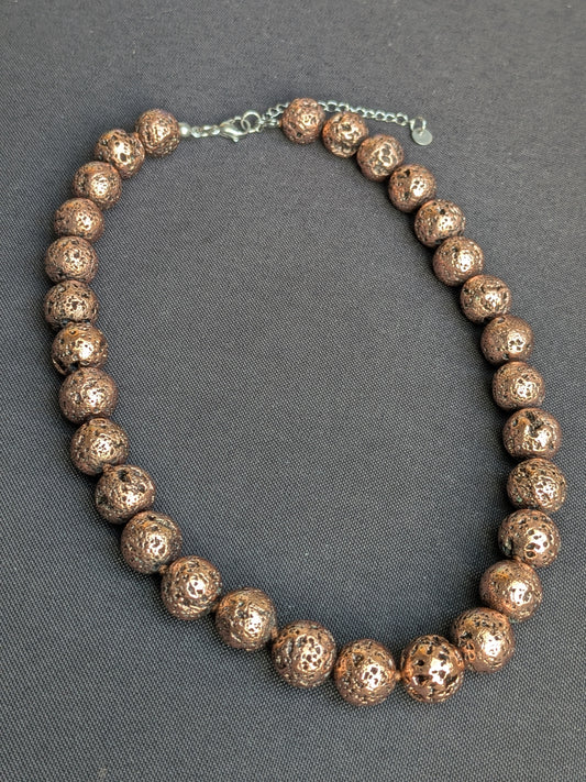 Collier boules pierre de lave cuivrée